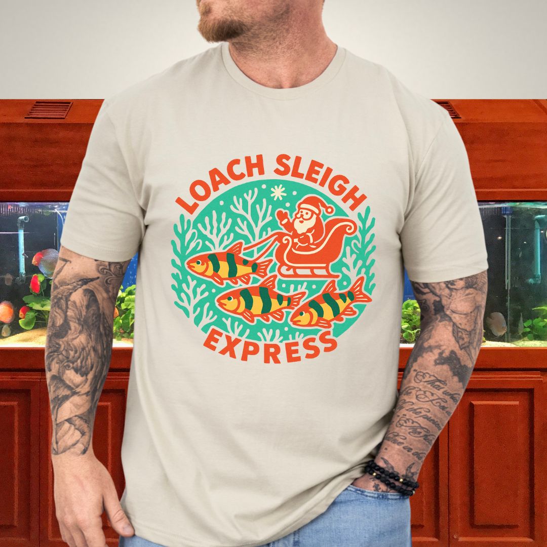 Loach Sleigh Express Tee – Retro Cartoon Clown Loach Christmas Shirt