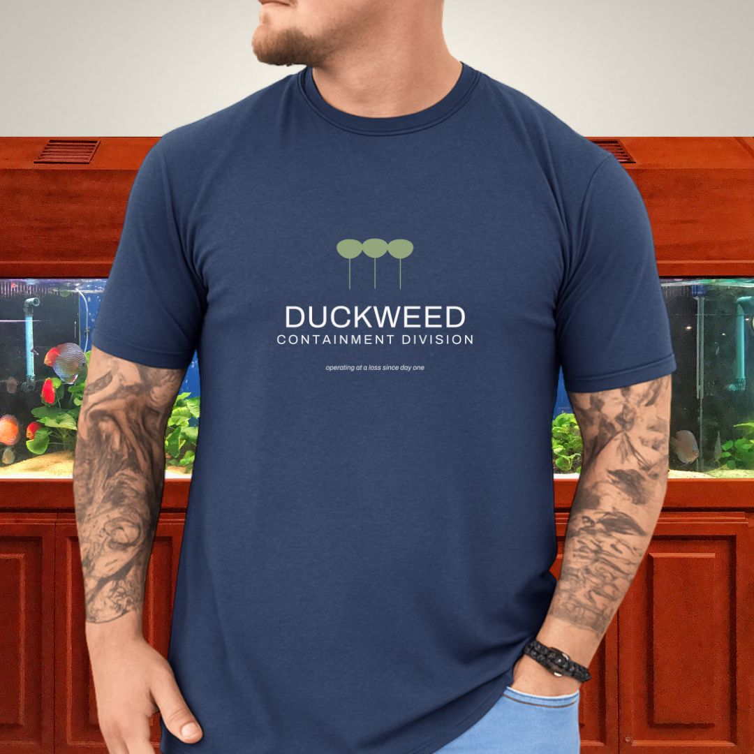 Two-color Duckweed Containment Division emblem with a Lemna minor colony on a unisex t-shirt