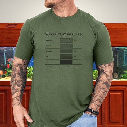 Line-art water test comparison card design (ammonia, nitrite, nitrate, pH, KH) on a heather red unisex t-shirt