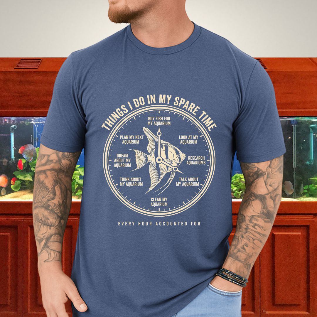 Vintage engraved angelfish clock badge with Every Hour Accounted For text on a heather indigo unisex t-shirt